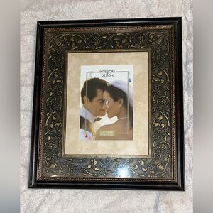 Intricate Black and Gold Picture Frame